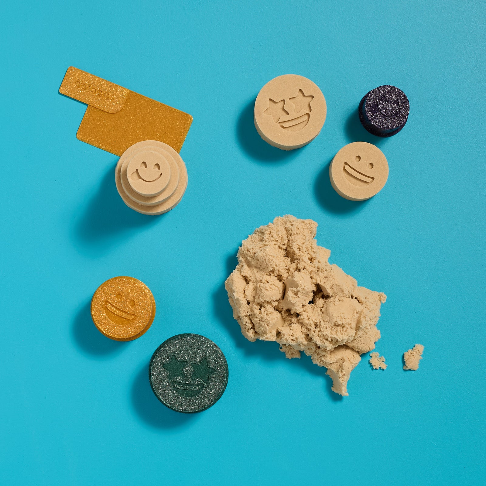 Group of finished Magic Sand creations from an ODIDOMI sensory activity kit for kids.