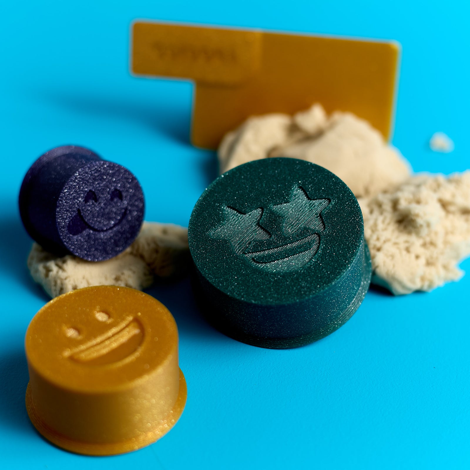 Close-up of molds included in the ODIDOMI Magic Sand sensory kit.