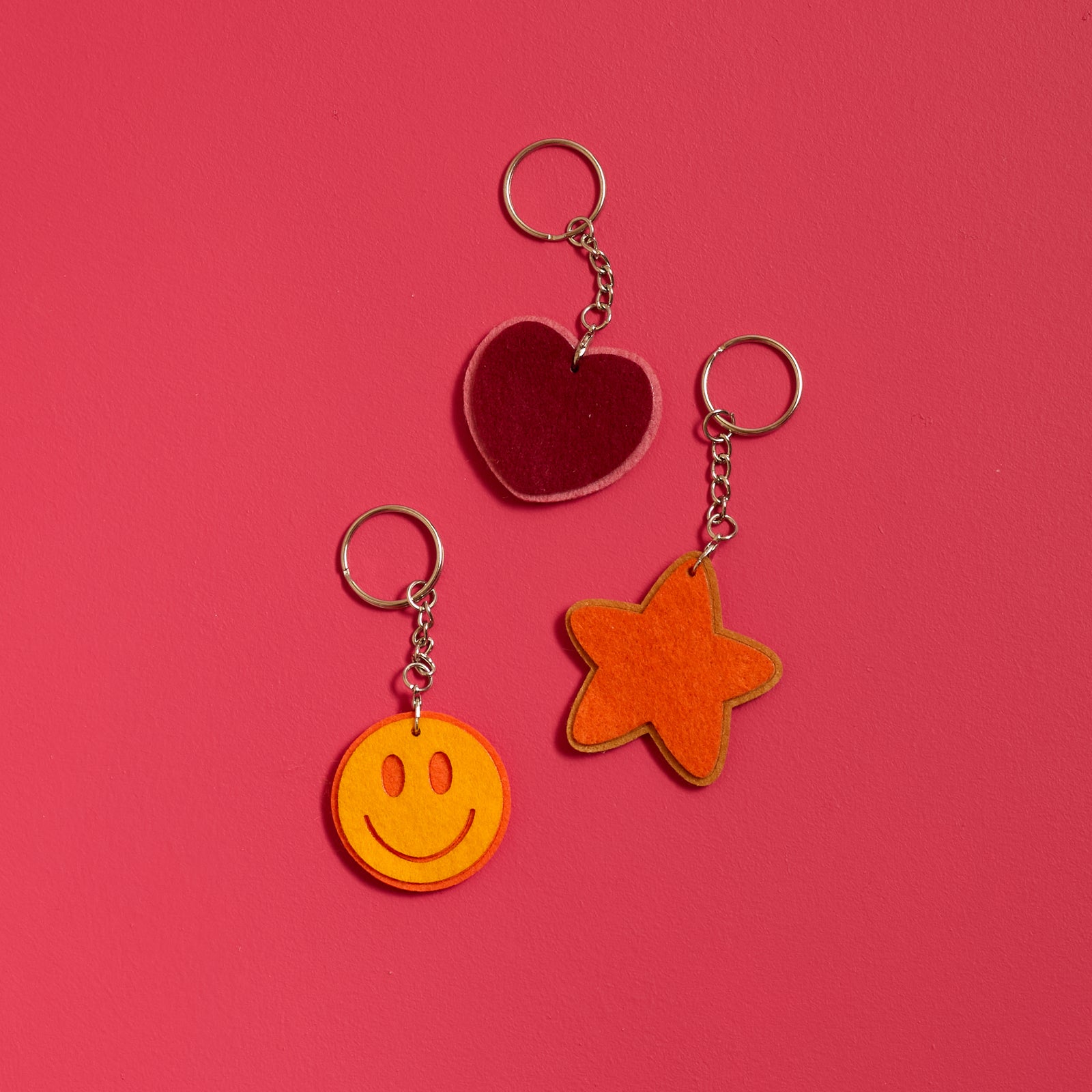 Overhead view of finished keychains created with the ODIDOMI Little Joy Keychain Kit.