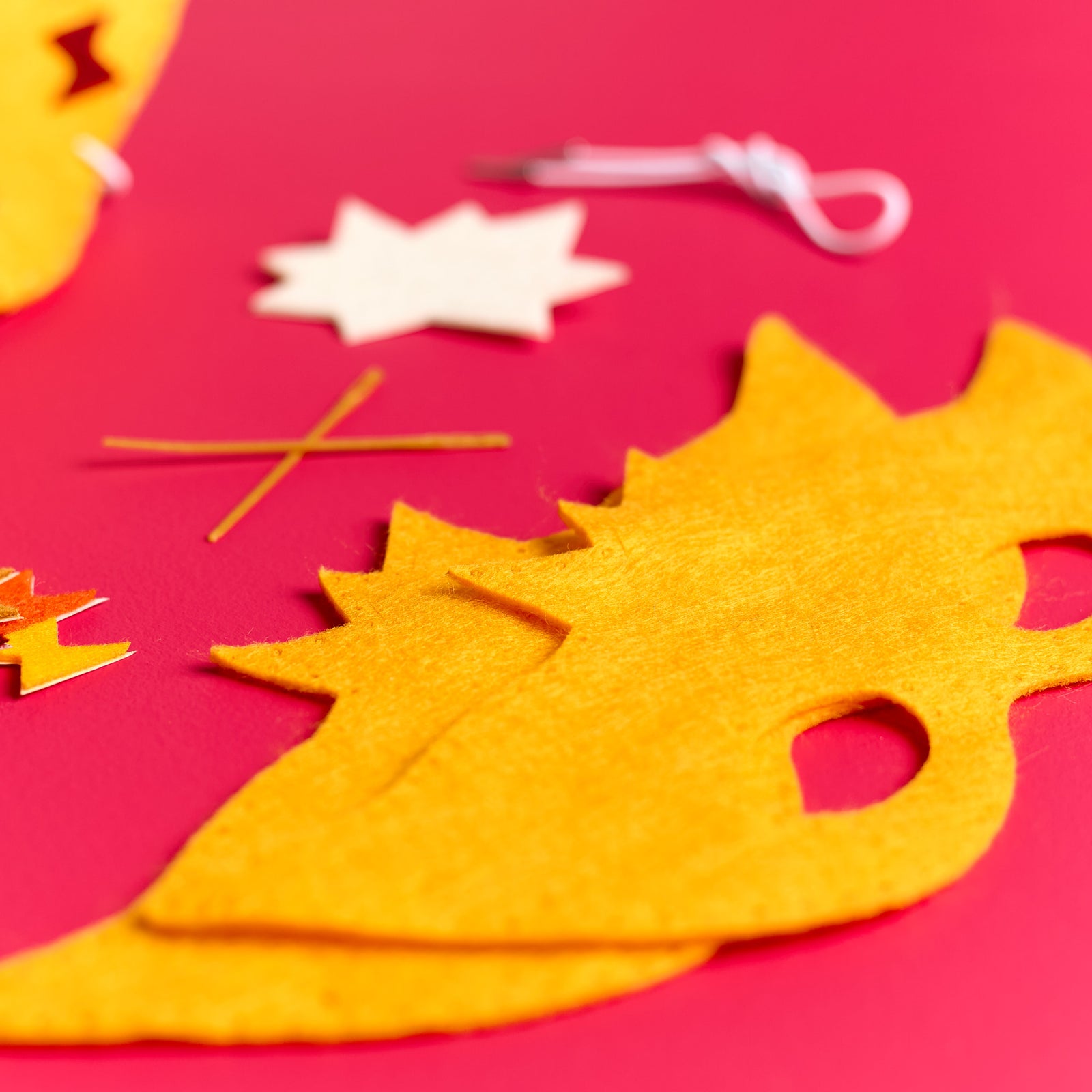 Close-up of parts included in the ODIDOMI Sew-Your-Own Superhero Mask kit.