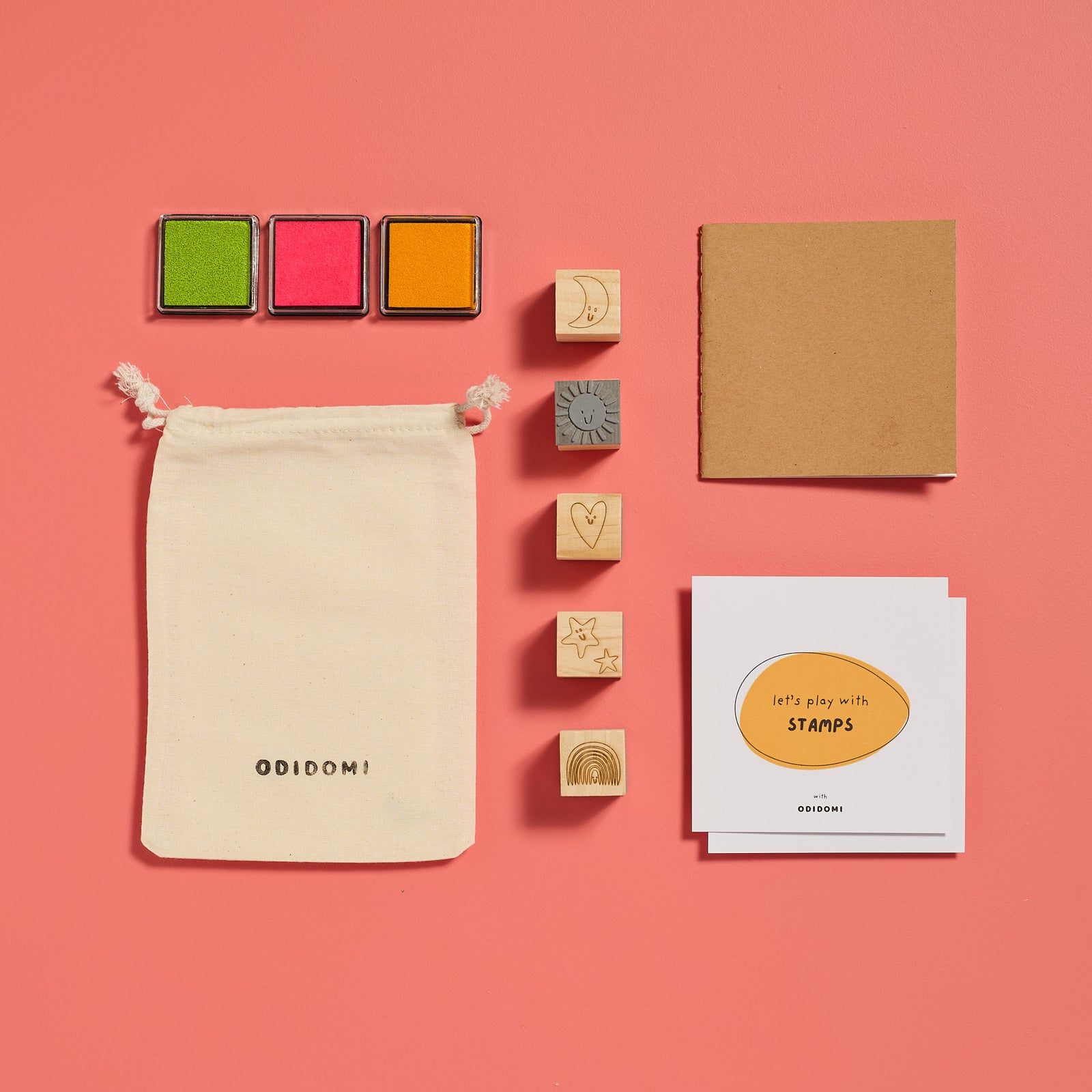 Flat lay of the complete ODIDOMI stamp kit for kids.
