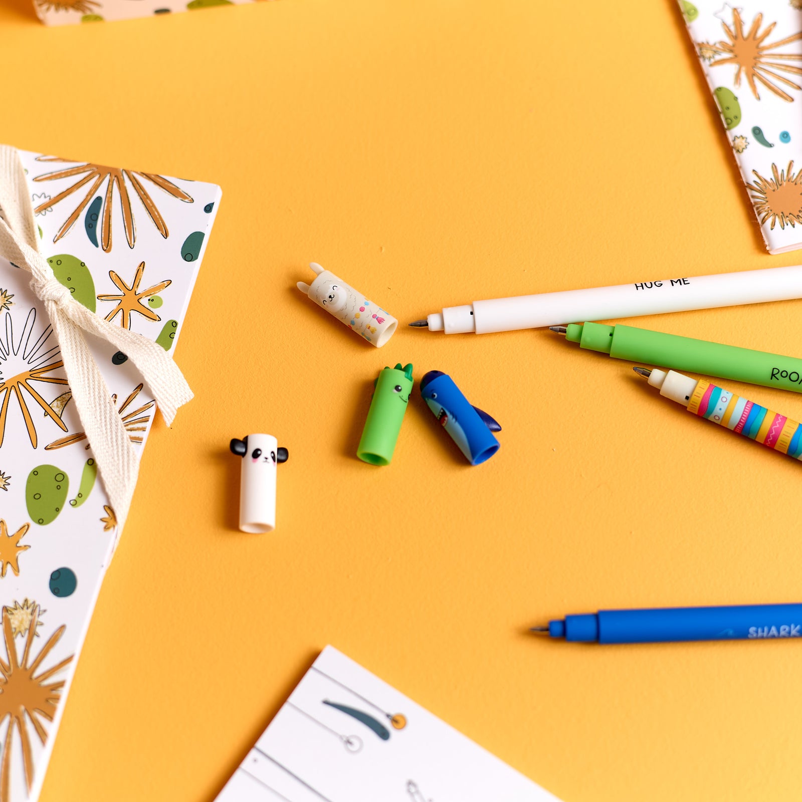 Close-up of all pen options included in the ODIDOMI stationery kit for kids.