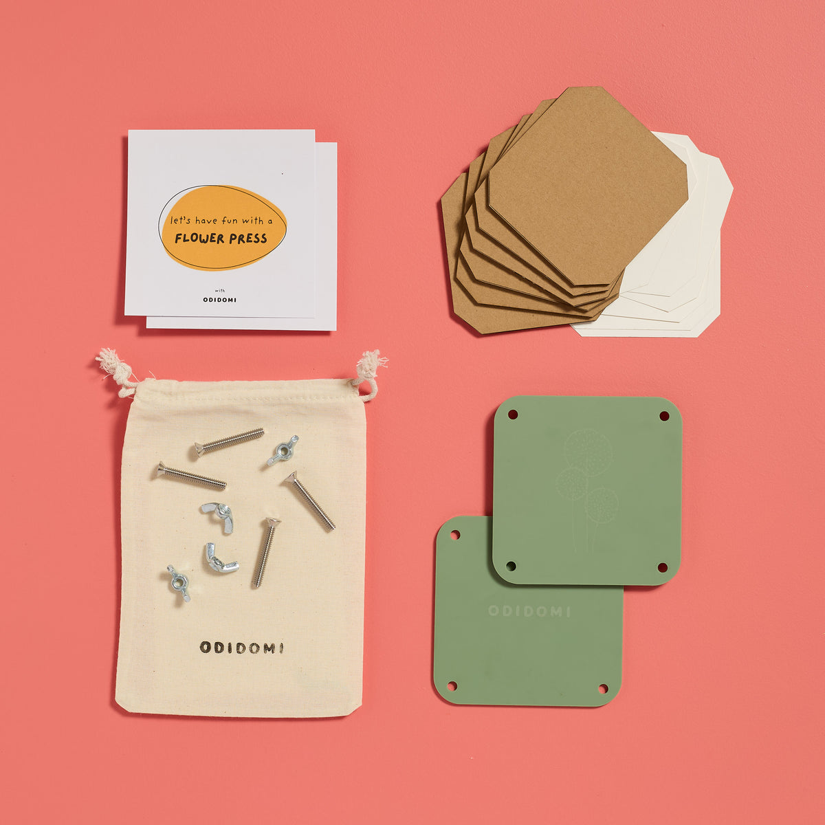 Flat lay of the complete ODIDOMI flower press kit for kids.