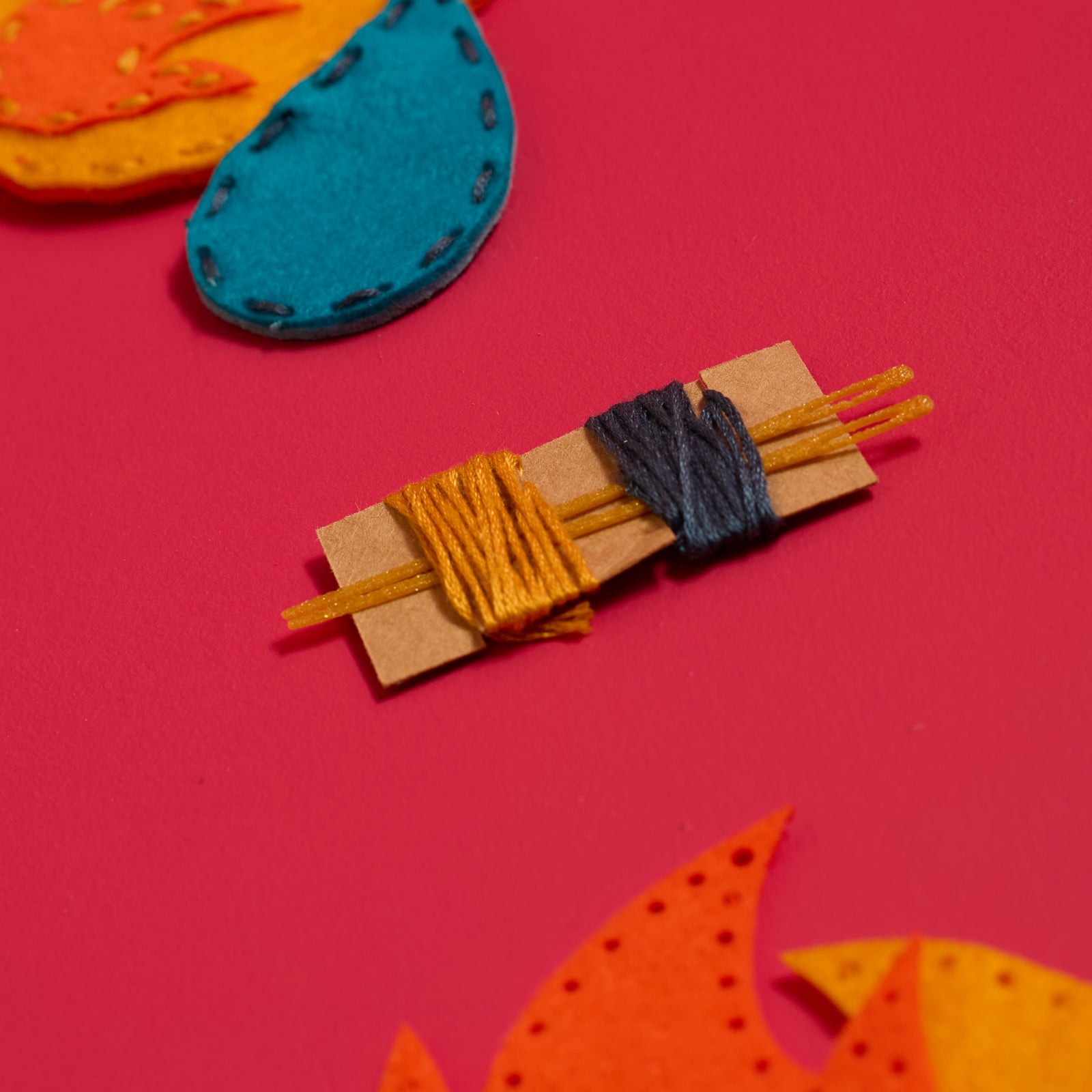 Embroidery thread and child-safe sewing needles included in the ODIDOMI Fire & Water Keychains Kit