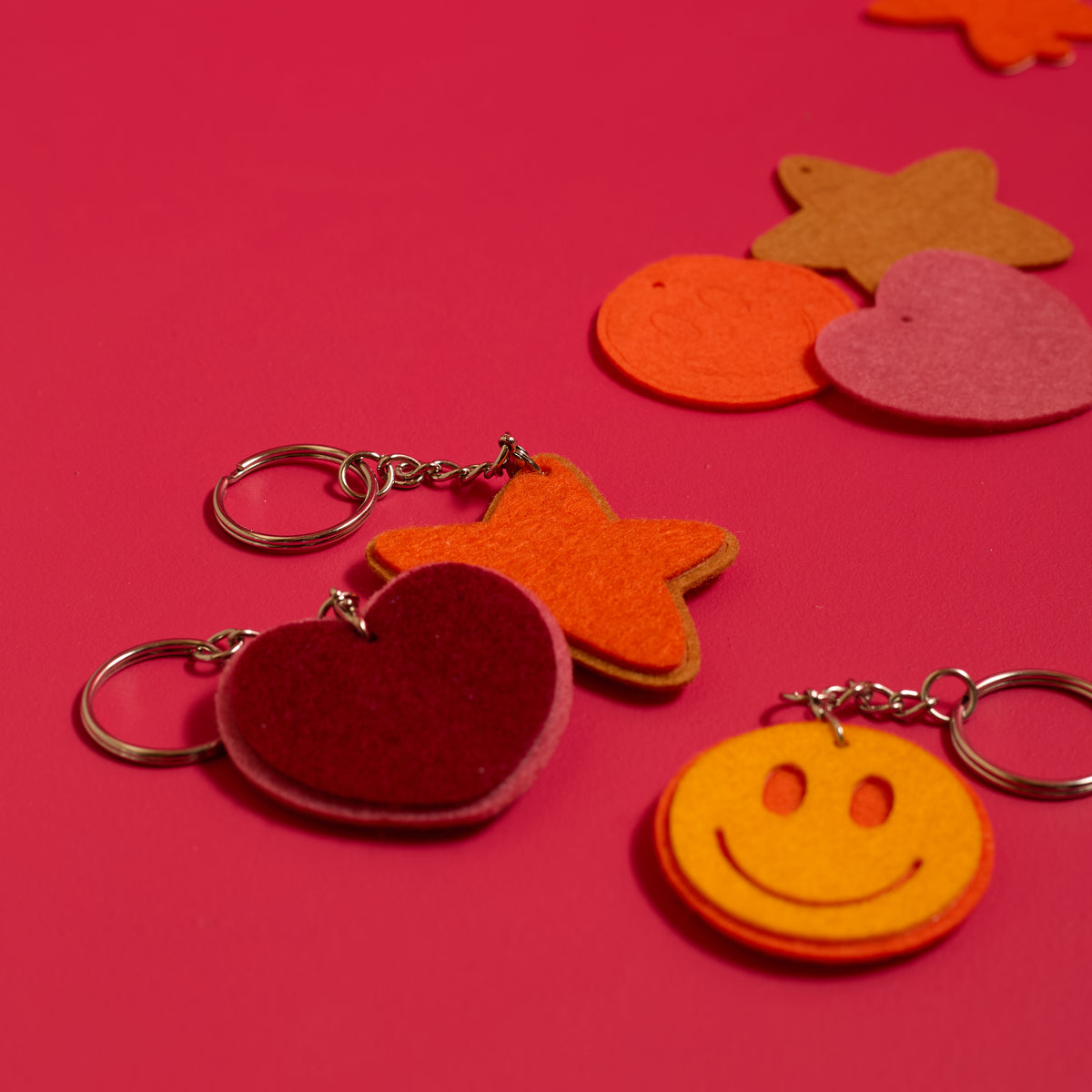 Close-up of colorful finished keychains from the ODIDOMI Little Joy Keychain craft kit.