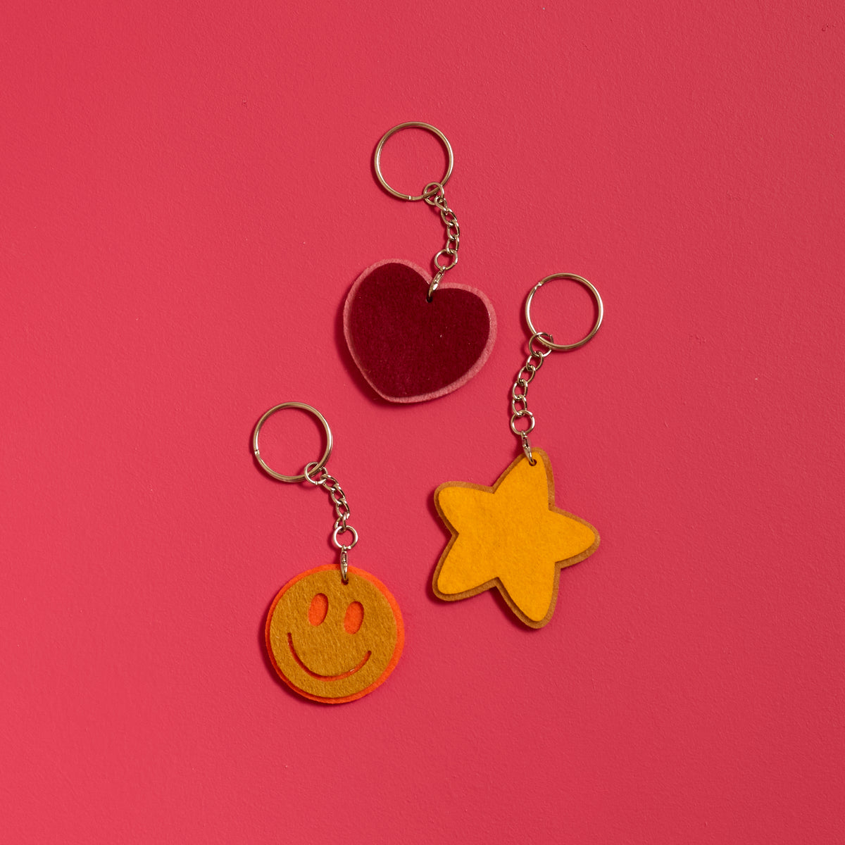 Overhead view of finished keychains created with the ODIDOMI Little Joy Keychain Kit.