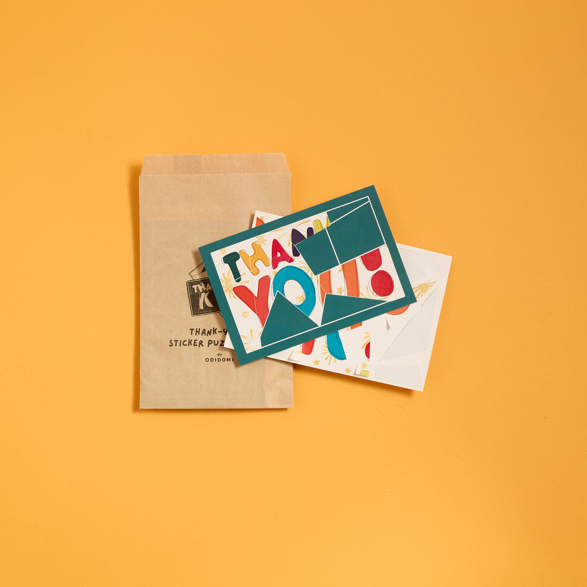 Front of ODIDOMI thank you puzzle card for kids party favors