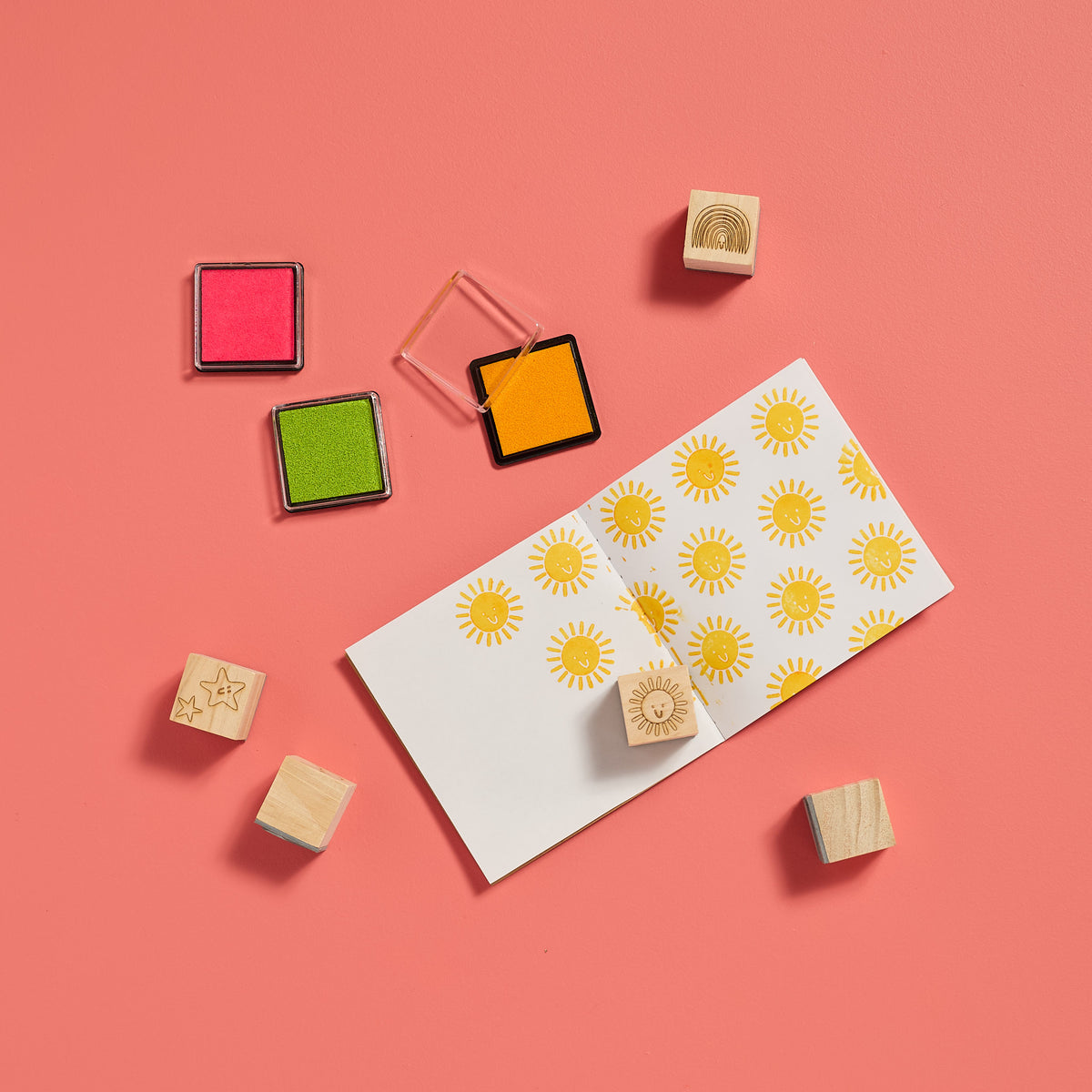 Overhead view of stamped creations made with the ODIDOMI stamp kit for kids.