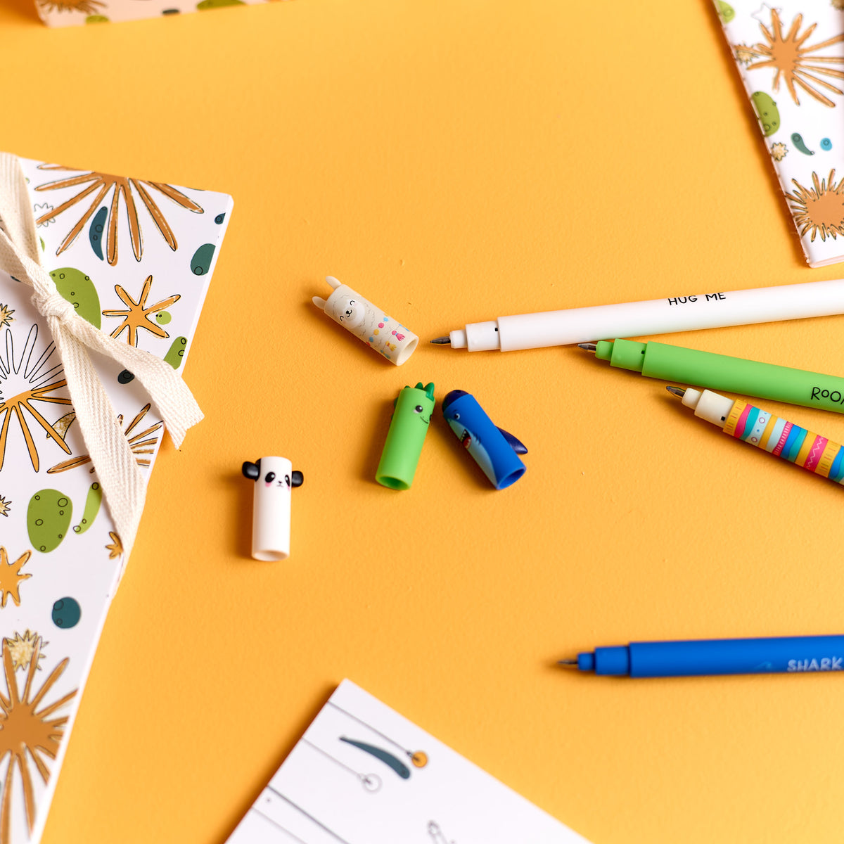 Close-up of all pen options included in the ODIDOMI stationery kit for kids.