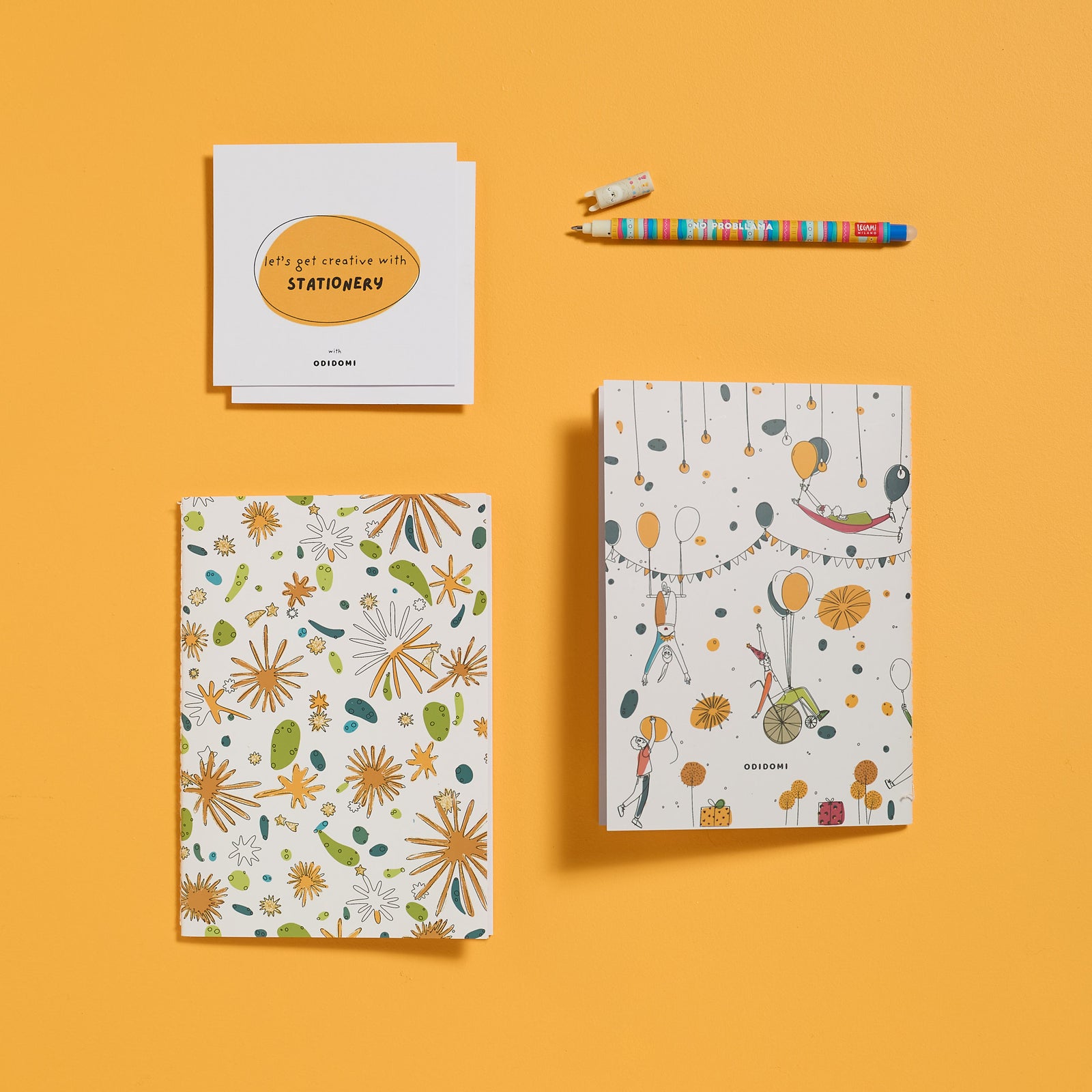 Flat lay of the complete ODIDOMI stationery kit with the Llama Pen option.