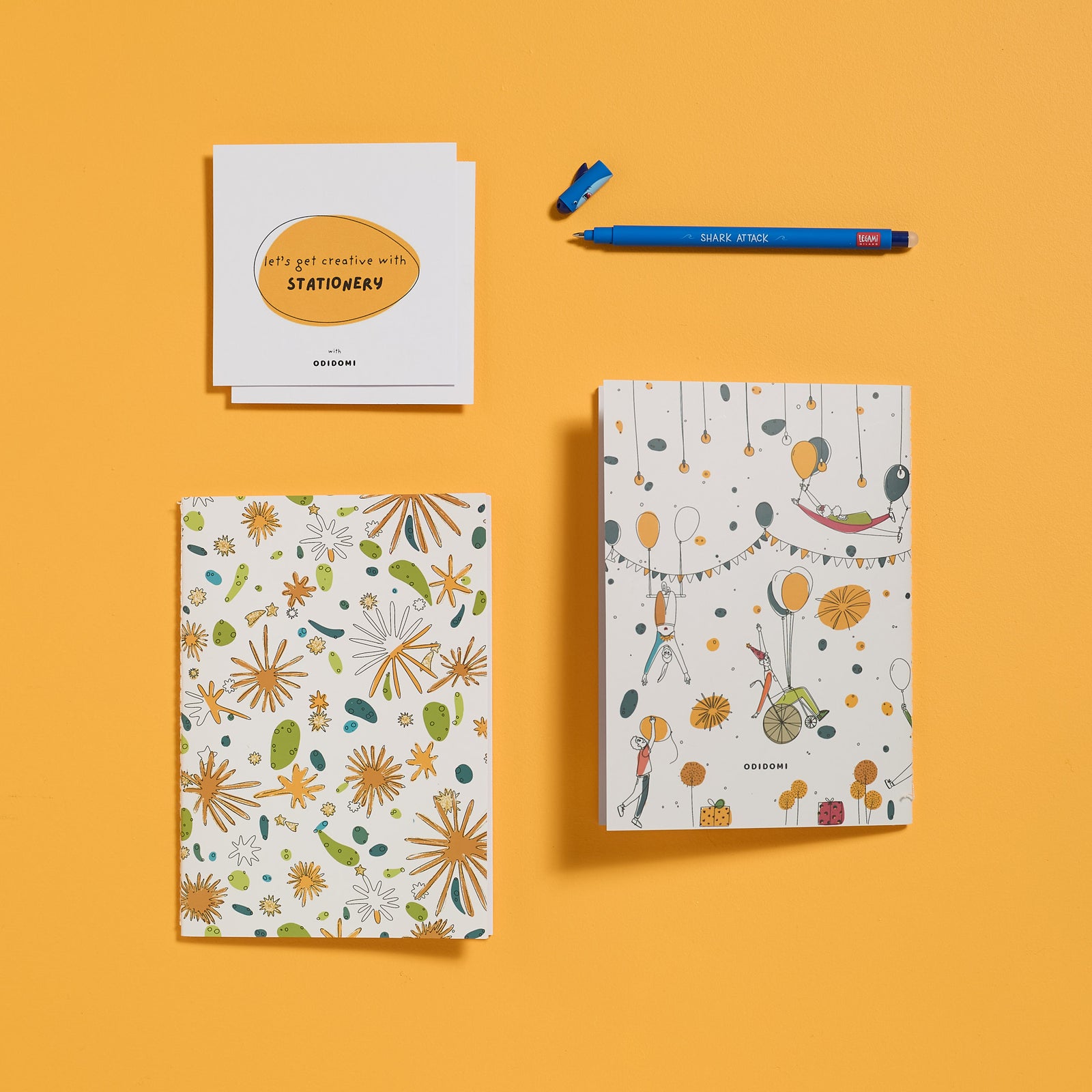 Flat lay of the complete ODIDOMI stationery kit with the Shark Pen option.