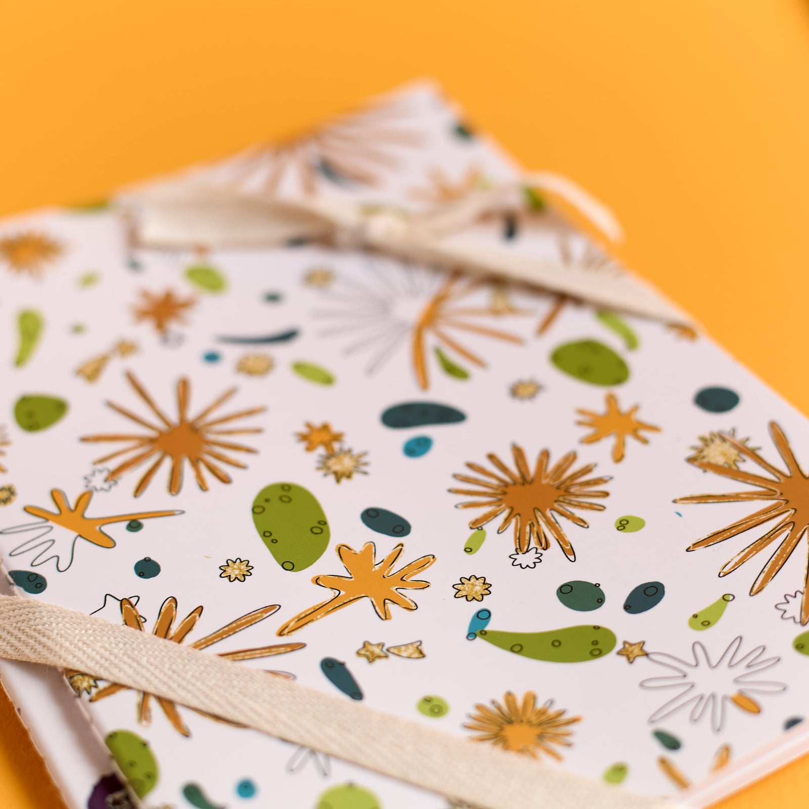 Close-up of the Nature Sparks notebook included in the ODIDOMI stationery kit.