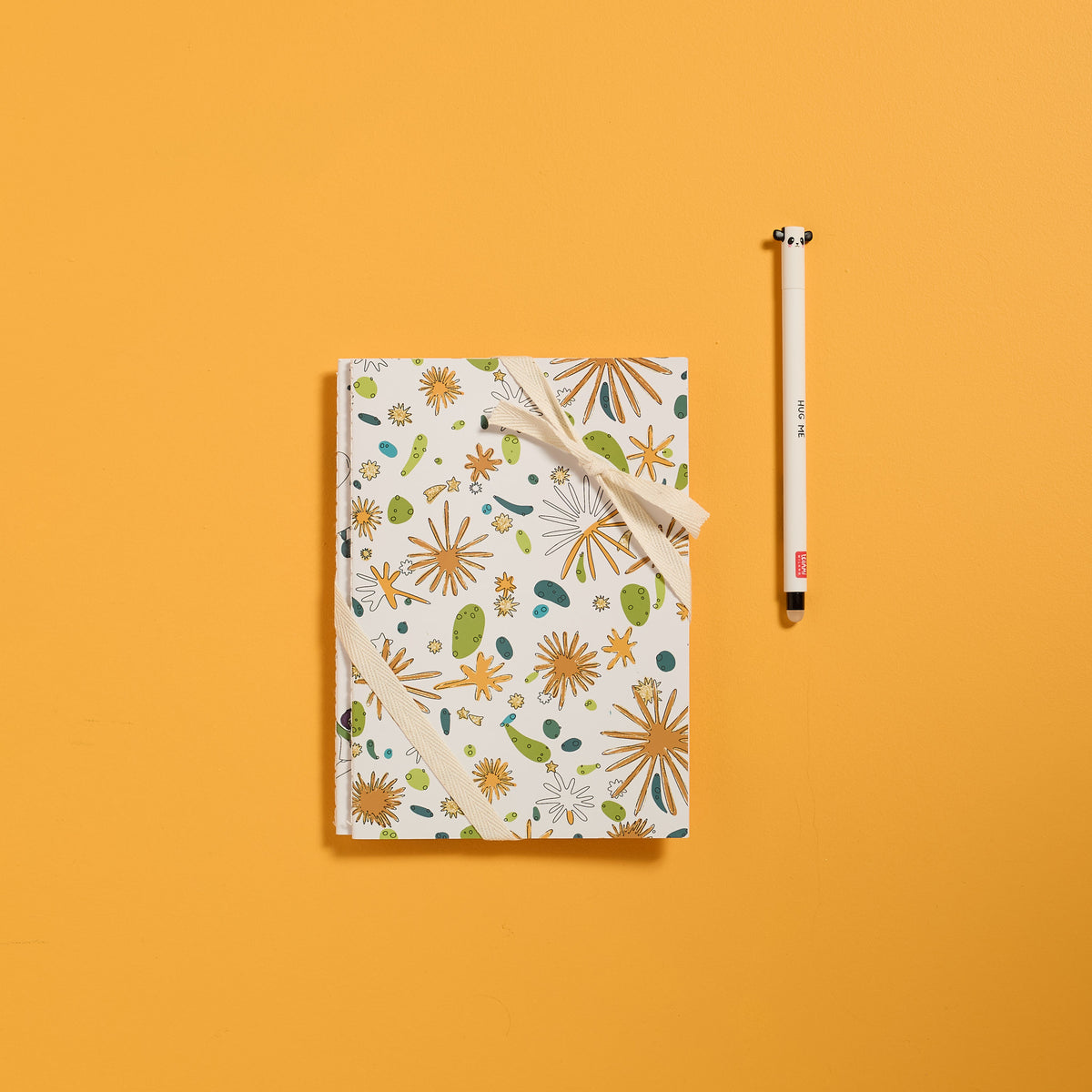 Overhead view of a notebook included in the ODIDOMI stationery kit.