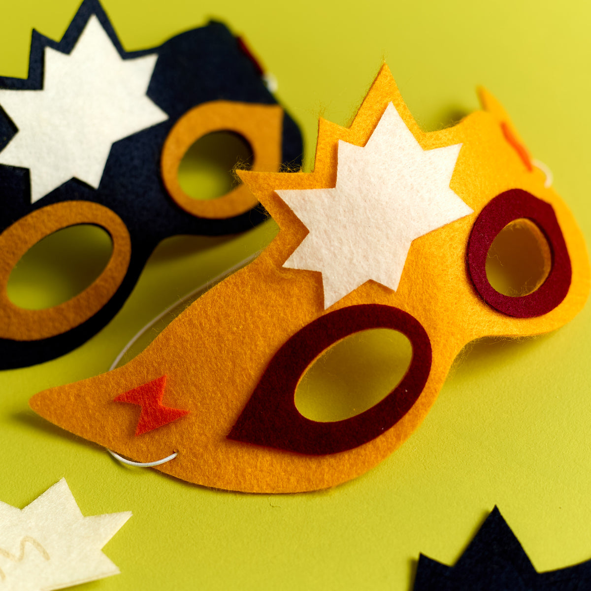Close-up of a finished Stick Superhero Mask created with an ODIDOMI kids craft kit.